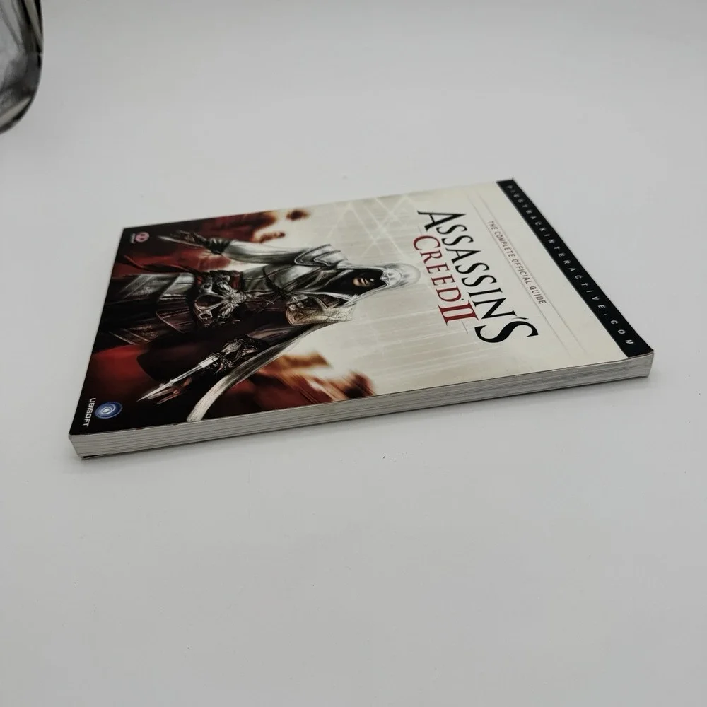 Assassins Creed II Complete‎ Official Guide Piggyback Ubisoft Map Included